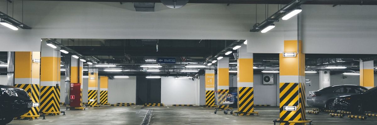 Construction site aerial view with contract documents for claims advisory